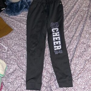 Women’s small grey cheer sweat pants.